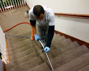 vacuuming hotel stairs